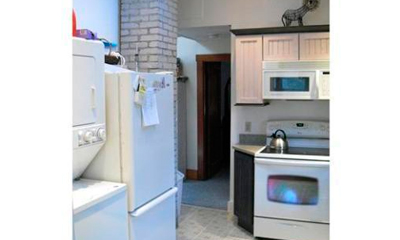 Laundry, kitchen view on 88 Langsford Street, Gloucester, MA 01930